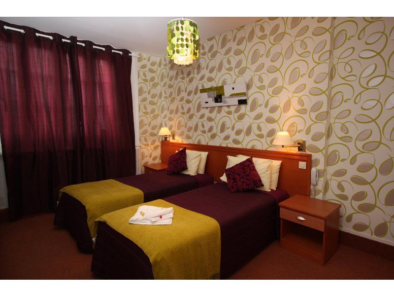 Hôtel Raymond 4 Toulouse Quarto foto