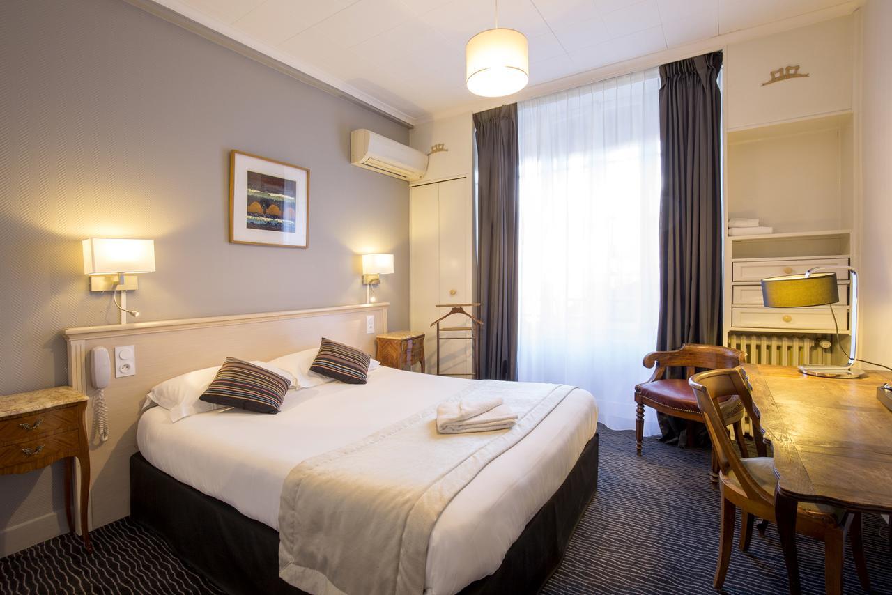 Hôtel Raymond 4 Toulouse Quarto foto